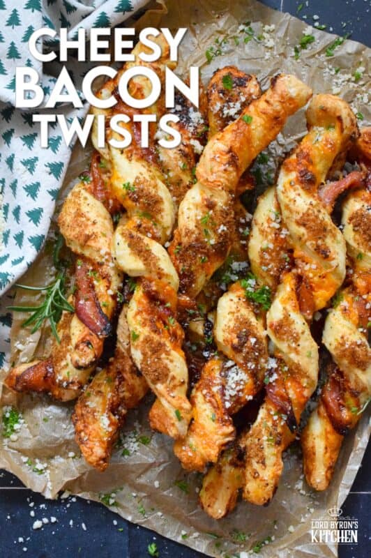 This appetizer consists of salty bacon twisted around light and airy, buttery puff pastry with shredded cheddar cheese all in brown sugar, thyme, oregano, garlic, onion, and ground black pepper seasoning! Words do not exist to describe how wonderfully delicious these are! #bacon #puffpastry #cheesy #appetizer