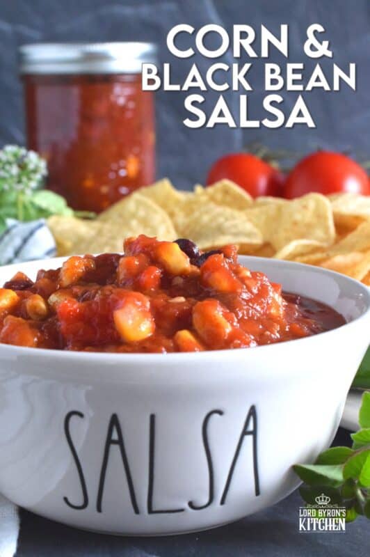 Corn and Black Bean Salsa not only includes all of your favourite salsa ingredients like tomatoes, peppers, and onions, but also has jalapenos, canned corn, and canned black beans too. Using a water bath canning method, it's easy to stock your pantry with this bright and fresh salsa recipe! #corn #blackbean #salsa #homemade #canned