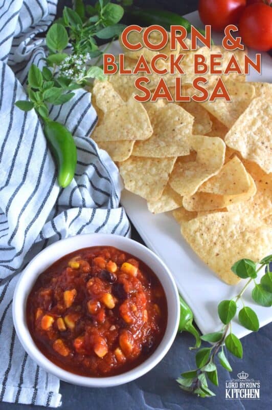 Corn and Black Bean Salsa not only includes all of your favourite salsa ingredients like tomatoes, peppers, and onions, but also has jalapenos, canned corn, and canned black beans too. Using a water bath canning method, it's easy to stock your pantry with this bright and fresh salsa recipe! #corn #blackbean #salsa #homemade #canned