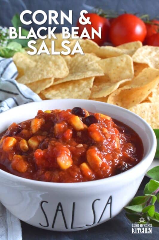 Corn and Black Bean Salsa not only includes all of your favourite salsa ingredients like tomatoes, peppers, and onions, but also has jalapenos, canned corn, and canned black beans too. Using a water bath canning method, it's easy to stock your pantry with this bright and fresh salsa recipe! #corn #blackbean #salsa #homemade #canned