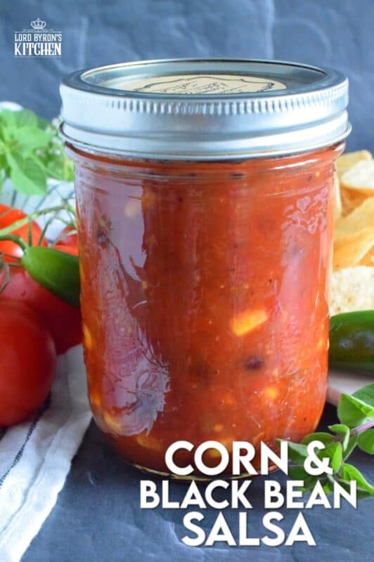 Corn and Black Bean Salsa not only includes all of your favourite salsa ingredients like tomatoes, peppers, and onions, but also has jalapenos, canned corn, and canned black beans too. Using a water bath canning method, it's easy to stock your pantry with this bright and fresh salsa recipe! #corn #blackbean #salsa #homemade #canned