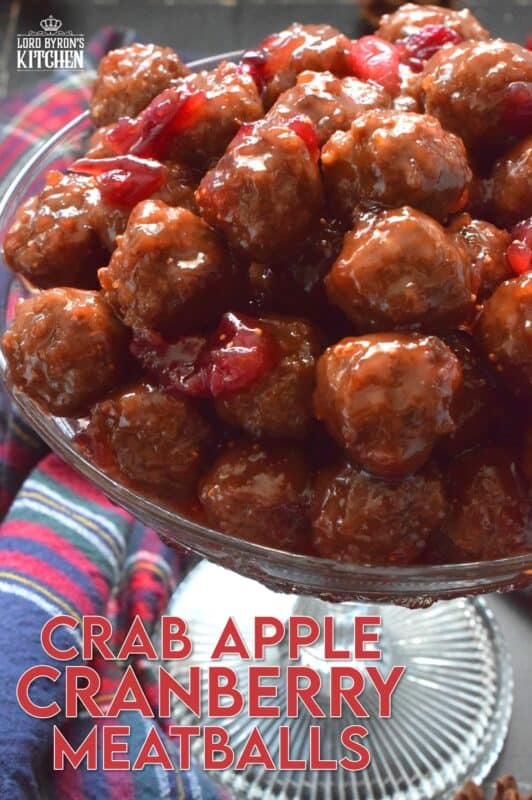 Serve these Crab Apple Cranberry Meatballs as a holiday appetizer and watch just how quickly they disappear! Store-bought frozen meatballs are paired with frozen cranberries, apple juice, and a jar of jelly to make a very delicious and festive party favourite! #crabapple #meatballs #holiday #appetizers