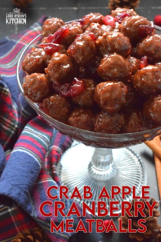 Serve these Crab Apple Cranberry Meatballs as a holiday appetizer and watch just how quickly they disappear! Store-bought frozen meatballs are paired with frozen cranberries, apple juice, and a jar of jelly to make a very delicious and festive party favourite! #crabapple #meatballs #holiday #appetizers