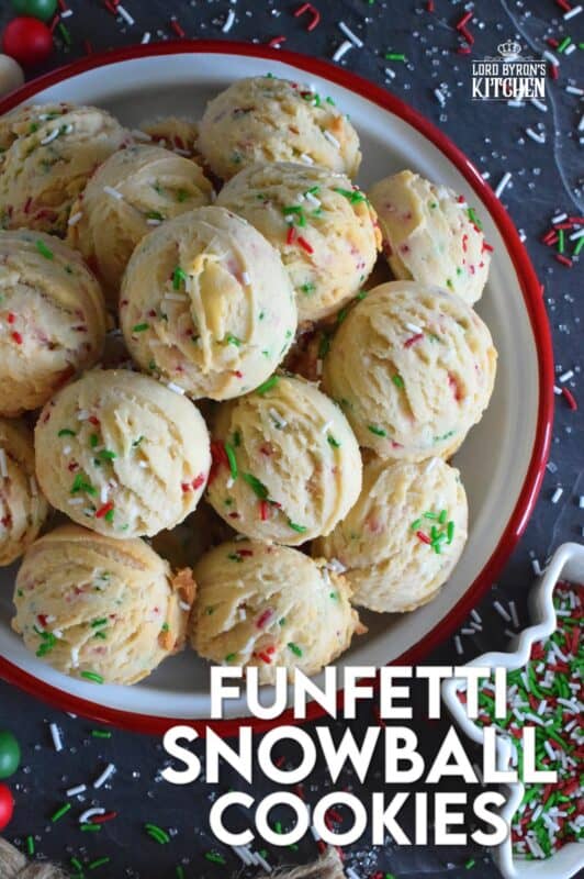 A holiday cookie platter must always have a cookie that is packed with sprinkles and these Funfetti Snowball Cookies fit the bill quite nicely! These are puffy, rounded cookies that require only a few of the most basic pantry ingredients, yet they look and taste amazing! #funfetti #christmas #cookies #sprinkles