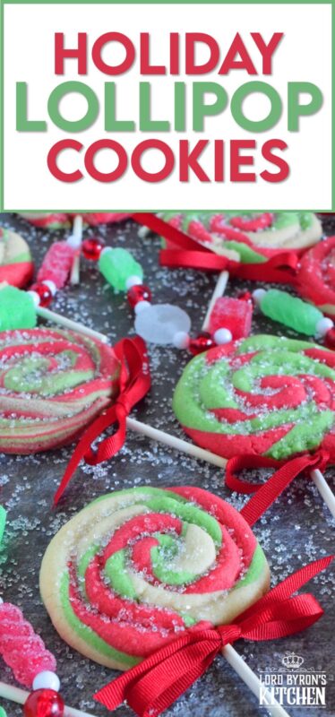 Add colour and pizzazz to your holiday cookie platter with these Holiday Lollipop Cookies! Spiralled and rolled cookie dough is topped with sparkling sugar and baked with a stick. These are sure to produce lots of smiles and crown you the winner of holiday baking! #lollipop #cookies #christmas