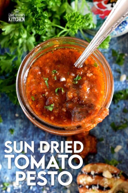 Homemade Sun Dried Tomato Pesto, otherwise known as Pesto Rosso, is so much better than store-bought. A combination of good olive oil, fresh basil and real parmesan cheese will make the best results. Use it on pasta, fish, chicken, and as a sandwich spread too! Who could resist this delicious, vibrant sauce? #sun #dried #sundried #tomato #pesto #basil #fresh #homemade