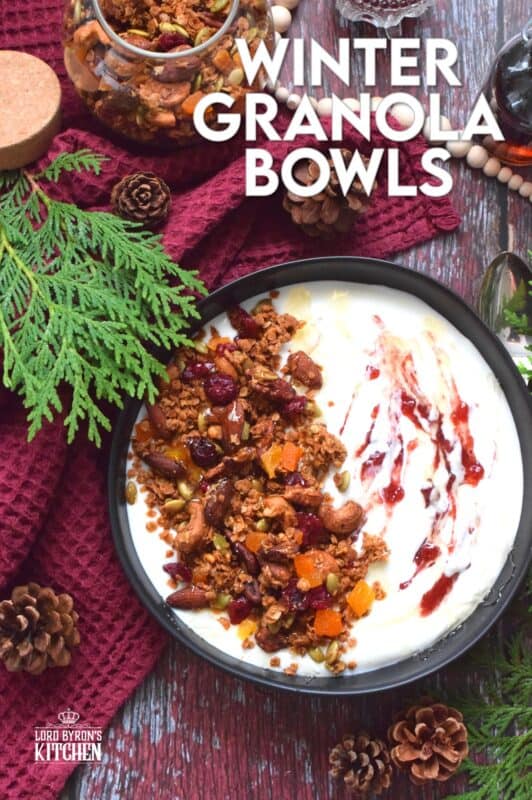 Almonds, cashews, pecans, pumpkin seeds, cranberries, and apricots help to flavour and bulk up homemade granola. Baked with maple syrup and butter, and seasoned with cinnamon, nutmeg, and allspice, these Winter Granola Bowls are healthy, warming, and filling too! #granola #breakfast #bowls #spiced