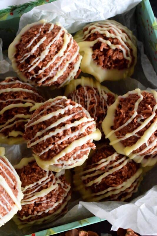 These no-bake Chocolate Coconut Macaroons are an easy, decadent, chocolaty treat. Keep them classic or try adding nuts, dried fruit, or even candy! So easy to prepare and freezer-friendly too, these make a great hostess gift as well! #nobake #chocolate #coconut #coconutmacaroons #macaroons