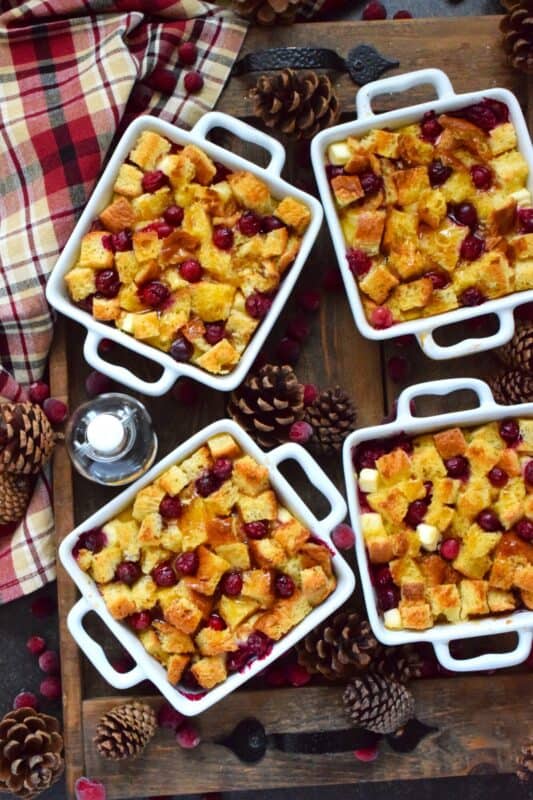 The ultimate comfort food for breakfast at Christmastime is this Cranberry and Cream French Toast.  Prepared the night before, making breakfast or brunch a cinch, brioche bread is layered with cranberries and cream cheese and soaked in a custard made with cream, maple syrup, vanilla, and nutmeg.  A holiday breakfast doesn't get any tastier than this! #frenchtoast #cranberries #breakfast #christmas #holiday 