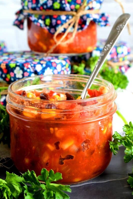 Corn, black beans, tomatoes, red bell peppers, onions, and chipotle in adobo sauce; is there a better salsa combination? Trader Joe's Copycat Cowboy Caviar is easy and delicious, and now you can stock your pantry with it and eat to your heart's content! #traderjoes #cowboy #caviar #copycat #recipe