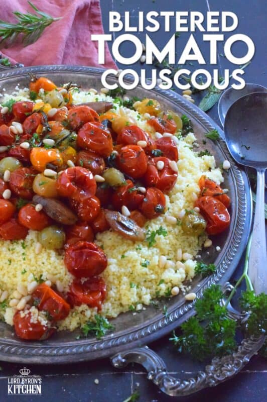Summer fresh cherry tomatoes are slowly roasted with garlic, onions, and herbs in olive oil until the skins have blistered. Spoon over cooked couscous and sprinkle with pinenuts for a delicous, comforting, and filling main or side! #couscous #confit #tomato #roasted