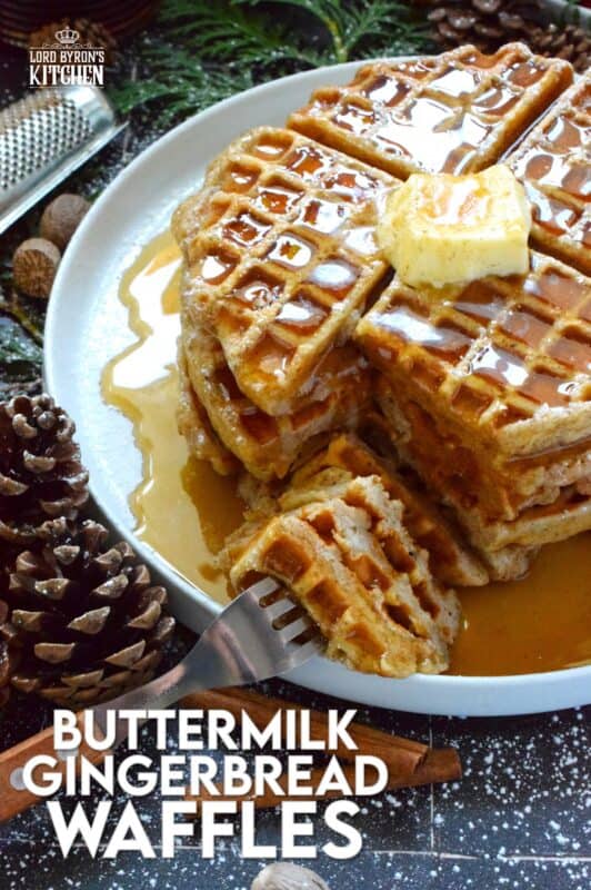 If Christmas had a flavour, it would be gingerbread, so let's start the day off right with these light and airy Buttermilk Gingerbread Waffles! These super easy-to-prepare homemade waffles are piled high and generously dressed with warm syrup and a pat of butter. #waffles #gingerbread #christmas #breakfast