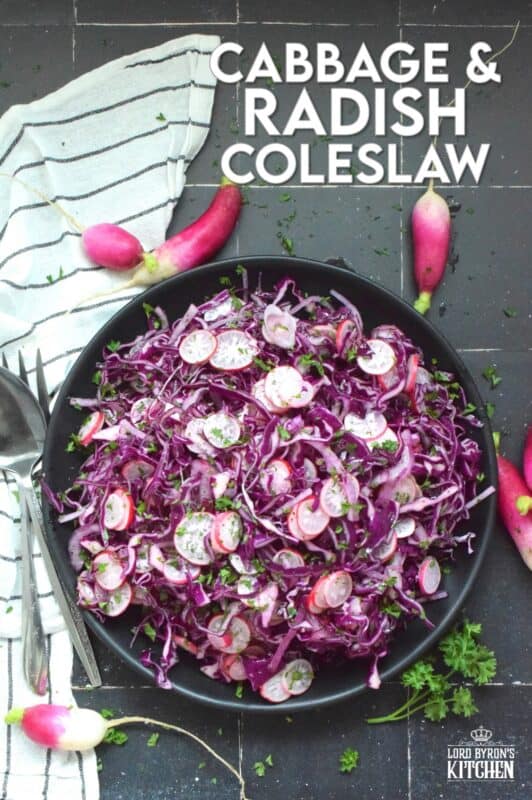 Fresh, crunchy red cabbage and peppery radish is paired with red onions to make this beautifully pink and purple Cabbage and Radish Coleslaw. Tossed with a homemade oil and vinegar dressing, this coleslaw is the epitome of fresh is best, and simple is better. #coleslaw #radish #cabbage #pinkandpurple