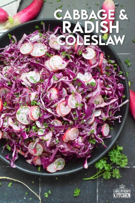 Fresh, crunchy red cabbage and peppery radish is paired with red onions to make this beautifully pink and purple Cabbage and Radish Coleslaw. Tossed with a homemade oil and vinegar dressing, this coleslaw is the epitome of fresh is best, and simple is better. #coleslaw #radish #cabbage #pinkandpurple