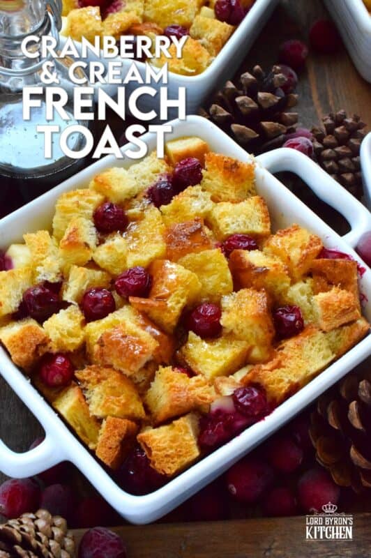 The ultimate comfort food for breakfast at Christmastime is this Cranberry and Cream French Toast.  Prepared the night before, making breakfast or brunch a cinch, brioche bread is layered with cranberries and cream cheese and soaked in a custard made with cream, maple syrup, vanilla, and nutmeg.  A holiday breakfast doesn't get any tastier than this! #frenchtoast #cranberries #breakfast #christmas #holiday 