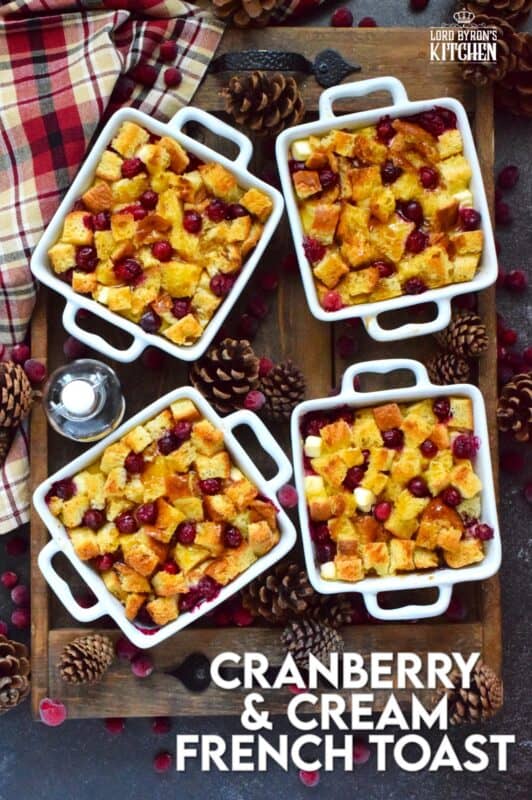 The ultimate comfort food for breakfast at Christmastime is this Cranberry and Cream French Toast.  Prepared the night before, making breakfast or brunch a cinch, brioche bread is layered with cranberries and cream cheese and soaked in a custard made with cream, maple syrup, vanilla, and nutmeg.  A holiday breakfast doesn't get any tastier than this! #frenchtoast #cranberries #breakfast #christmas #holiday 