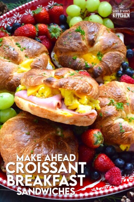 Prepared with scrambled eggs, ham, and lots of melting cheese, these Make Ahead Croissant Sandwiches can be prepared weeks in advance.  These are so delicious, you might want to make them often, not just for Christmas morning! #croissant #breakfast #sandwich #makeahead