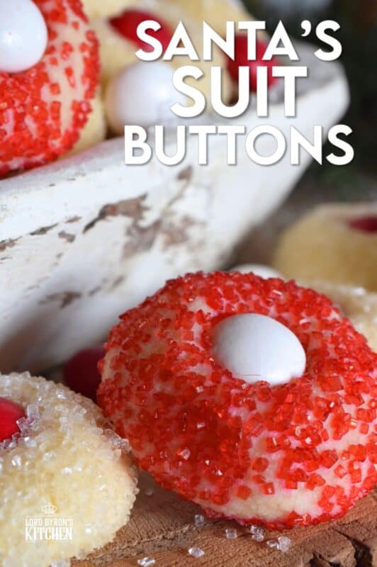 These are miniature, one-bite cookies that are made with Christmas M&M candy centers. Santa's Suit Buttons are a wonderful gift idea, a great baking project with the kids, or bake them alone and save them all for yourself! #santassuit #buttons #cookies #christmas #holiday #baking #kids