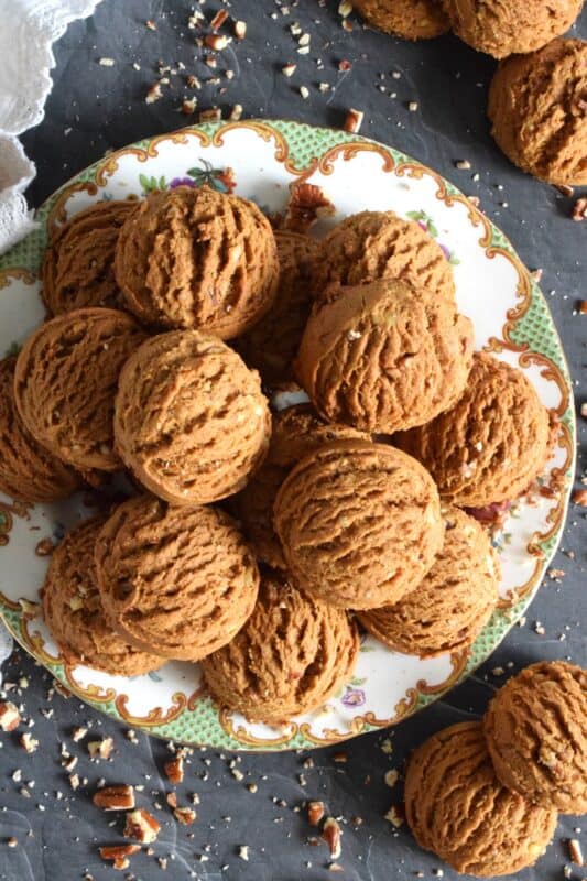 These plump, soft cookies are made with lots of familiar spices associated with fall baking. Pecan Molasses Cookies are very easy to prepare; simply make the cookie dough and use a cookie scoop to portion out mounds onto your baking sheet. Let your oven do the rest! These are one of my all-time favourite cookies! #pecan #molasses #cookies