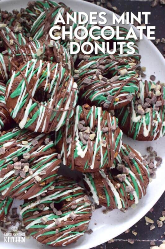These donuts are loaded with mint flavour and are meant for serious mint and chocolate lovers. Andes Mint Chocolate Donuts are baked with good cocoa, mint extract, and mint chocolate, and topped with green candy melts and melted white and milk chocolate. It was so hard to eat just one of these! #andesmints #chocolates #donuts