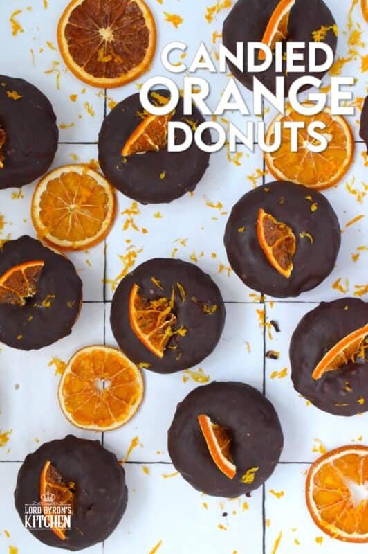 The combination of chocolate and orange is often found in holiday baking, and oranges have quite a history when it comes to being a staple in most Christmas traditions. Candied Orange Donuts is the dessert you didn't know you needed this Christmas! #candied #orange #donut #doughnut