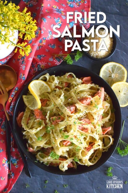 Salmon fillets are lightly seasoned and fried in butter until they are perfectly done. The salmon is gently flaked into bite-sized pieces and tossed with cooked pasta, lemon juice and zest, and lots of garlic. Fried Salmon Pasta is a beautiful and delicious main which takes less than 30 minutes from start to finish! #salmon #pasta #seafood #spaghetti #lemongarlic