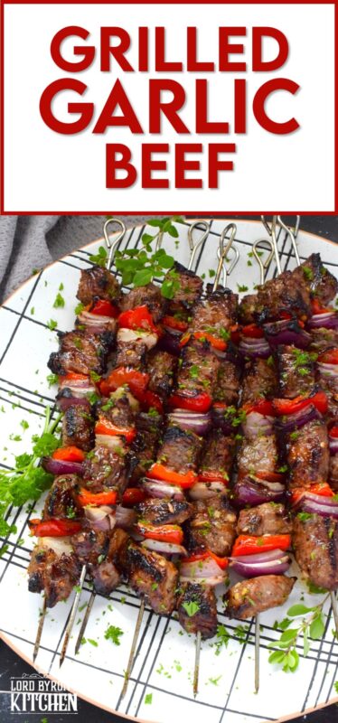 Marinated and skewered, Grilled Garlic Beef is simple and easy to prepare, but the flavour is extraordinary! The quick-to-prepare marinade is loaded with garlic which both permeates the beef and tenderizes it too. The addition of the onions and sweet bell peppers round out the flavour. #beef #garlic #garlicky #grill #bbq
