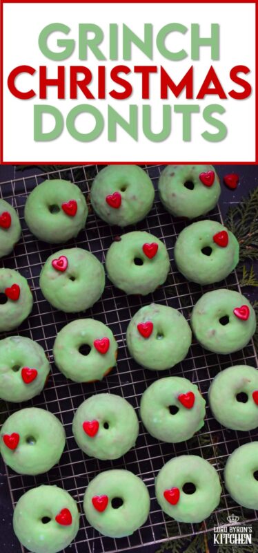 Grinch-themed confections are very popular at Christmastime, especially with kids! But even the adults will love these Grinch Christmas Donuts! Prepared with a baked basic donut recipe, these are dipped in green icing and despite the fact that the Grinch’s heart was three sizes too small, I’ve used the biggest red candy heart I could find! #ginch #donuts