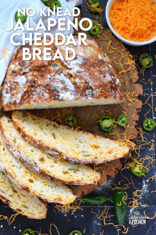 There’s something really soothing and satisfying about freshly baked bread. Even more so when you bake that bread yourself! No Knead Jalapeno Cheddar Bread is one of the most delicious and easiest breads you'll ever make! Loaded with freshly chopped jalapenos and grated cheese, this bread is cheesy and moderately spicy - perfect to dip into soup! #bread #dutchoven #jalapeno #cheddar #artisan #homemade