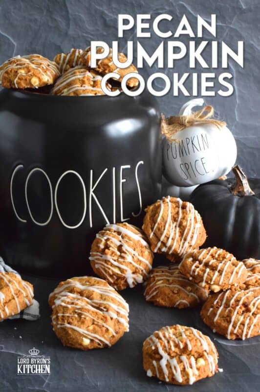 Pecan Pumpkin Cookies are prepared with molasses, real pumpkin puree, lots of pumpkin spice flavour, white chocolate chips, and chopped pecans. Topped with a sweet glaze, they are delectably moist and flavourful. If you're looking for a cookie that tastes like fall, look no further! #pumpkin #pecan #spice #puree #cookies