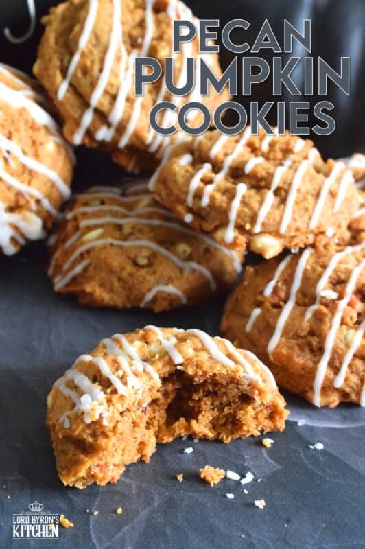 Pecan Pumpkin Cookies are prepared with molasses, real pumpkin puree, lots of pumpkin spice flavour, white chocolate chips, and chopped pecans. Topped with a sweet glaze, they are delectably moist and flavourful. If you're looking for a cookie that tastes like fall, look no further! #pumpkin #pecan #spice #puree #cookies