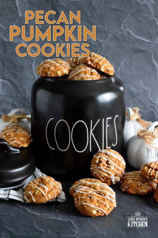 Pecan Pumpkin Cookies are prepared with molasses, real pumpkin puree, lots of pumpkin spice flavour, white chocolate chips, and chopped pecans. Topped with a sweet glaze, they are delectably moist and flavourful. If you're looking for a cookie that tastes like fall, look no further! #pumpkin #pecan #spice #puree #cookies