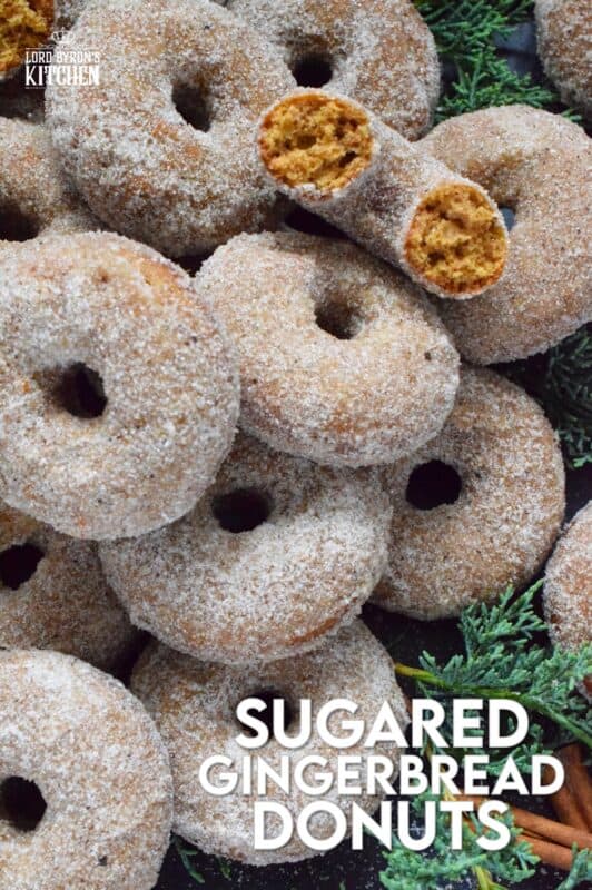 Prepared with everyone's favourite seasoning spices, like cinnamon, nutmeg, ginger, cloves, and allspice, these Sugared Gingerbread Donuts are baked and rolled in sugar while still warm out of the oven. Indulgent, sweet, rich, and delicious, these donuts taste like Christmas! #gingerbread #donuts #bakednotfried
