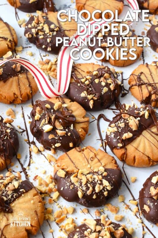 In our home, you cannot go wrong with the classic combination of peanut butter and chocolate! These delicious Chocolate Dipped Peanut Butter Cookies are dipped in melted chocolate and topped with a sprinkling of chopped salted peanuts. These are so easy to make, so whip up several batches and gift them to your friends, neighbours, and coworkers! #peanutbutter #cookies #chocolate #christmas #holiday #baking