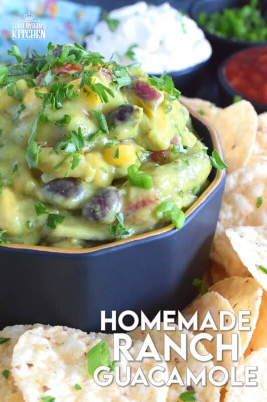 Dig into this new and exciting flavour combination and add additional flair to your favourite meals and snacks! Homemade Ranch Guacamole is prepared with the ingredients used to make black bean and corn guacamole along with the herbs and spices used in a homemade ranch seasoning blend. #ranch #dip #guacamole