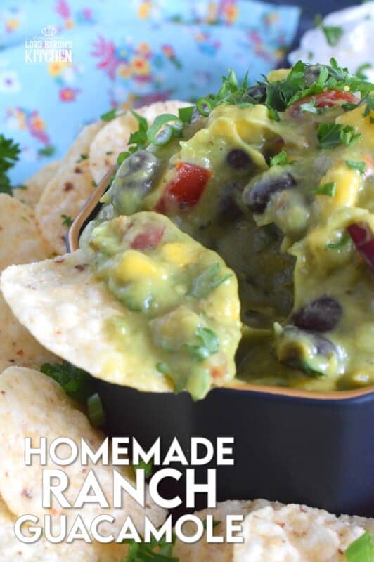 Dig into this new and exciting flavour combination and add additional flair to your favourite meals and snacks! Homemade Ranch Guacamole is prepared with the ingredients used to make black bean and corn guacamole along with the herbs and spices used in a homemade ranch seasoning blend. #ranch #dip #guacamole