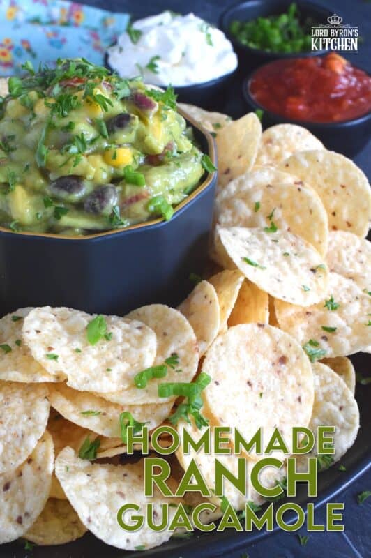 Dig into this new and exciting flavour combination and add additional flair to your favourite meals and snacks! Homemade Ranch Guacamole is prepared with the ingredients used to make black bean and corn guacamole along with the herbs and spices used in a homemade ranch seasoning blend. #ranch #dip #guacamole