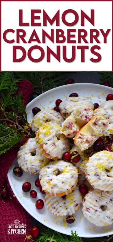 The tartness of lemon and cranberries is well balanced with sugary sweetness in these delightfully refreshing Lemon Cranberry Donuts! Prepared with freshly squeezed lemon juice and lemon zest, chopped cranberries, and a lemony glaze, these donuts are simply irresistible! #lemon #cranberry #donuts