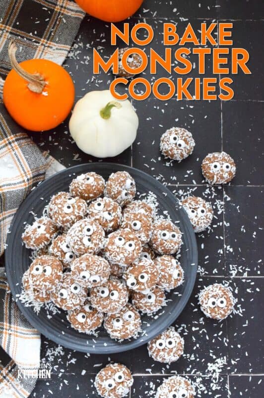 Prepared with melted marshmallows, cocoa powder, sweetened condensed milk, and graham cracker crumbs, No Bake Monster Cookies are sure to give you autumn smores vibes. The addition of the googly candy eyes in the center of each cookie helps make these cookies feel and look perfectly ready for Halloween! #halloween #monster #nobake #cookies #balls