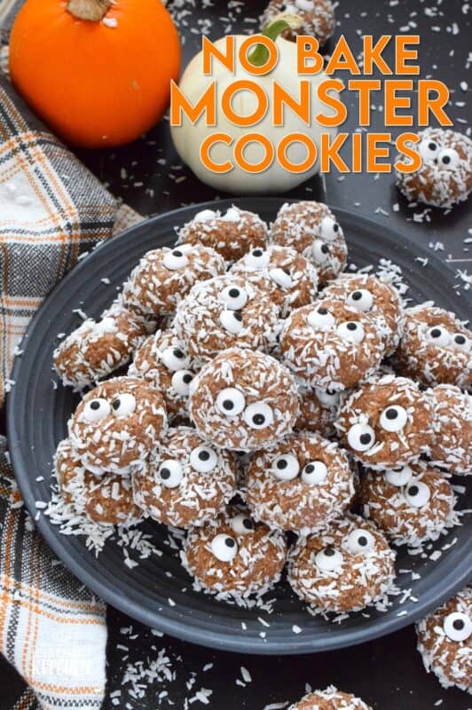 Prepared with melted marshmallows, cocoa powder, sweetened condensed milk, and graham cracker crumbs, No Bake Monster Cookies are sure to give you autumn smores vibes. The addition of the googly candy eyes in the center of each cookie helps make these cookies feel and look perfectly ready for Halloween! #halloween #monster #nobake #cookies #balls