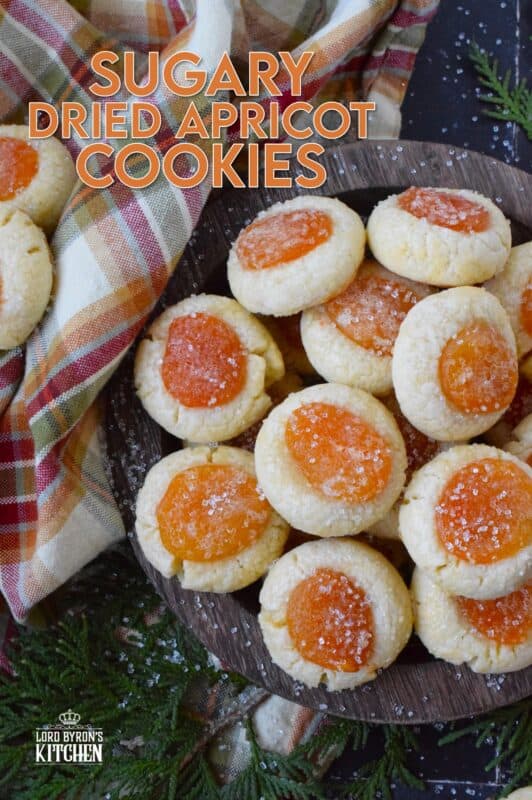 Sugary Dried Apricot Cookies are prepared with a mild and lightly sweetened cookie dough so that the flavour of the dried apricot is at the forefront. Sprinkled with a glistening sugary topping, these simple cookies are so flavourful and quite pretty too! The texture of the apricot and the soft crumble of the cookie is a perfect pairing. #apricot #dried #christmas #cookies