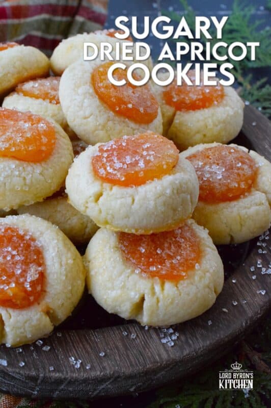 Sugary Dried Apricot Cookies are prepared with a mild and lightly sweetened cookie dough so that the flavour of the dried apricot is at the forefront. Sprinkled with a glistening sugary topping, these simple cookies are so flavourful and quite pretty too! The texture of the apricot and the soft crumble of the cookie is a perfect pairing. #apricot #dried #christmas #cookies