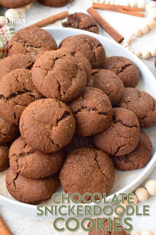 Everyone loves the original snickerdoodle cookie, but this chocolate version is even more delicious!  Prepared with brown sugar and cocoa, the cookies are rolled in a cinnamon sugar mixture, which gives the cookie that recognizable and familiar crinkly appearance.  Chocolate Snickerdoodle Cookies are soft and chewy with slightly crispy outer edges. #snickerdoodles #christmas #cookies #cinnamon