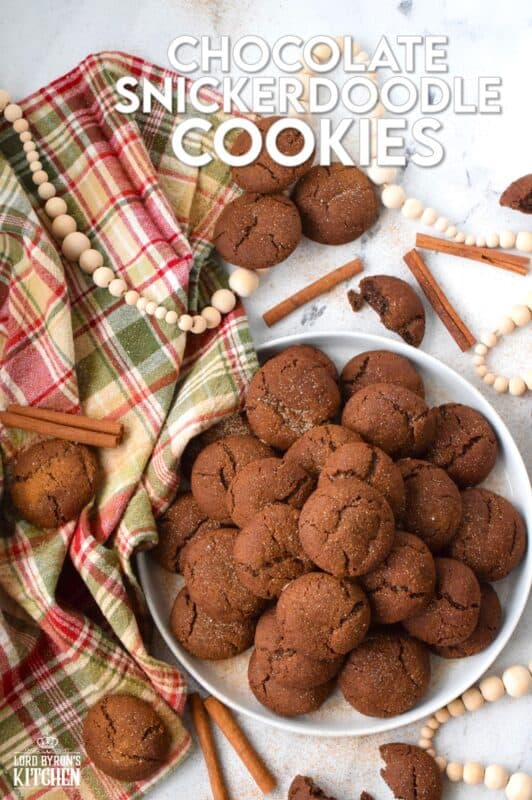 Everyone loves the original snickerdoodle cookie, but this chocolate version is even more delicious!  Prepared with brown sugar and cocoa, the cookies are rolled in a cinnamon sugar mixture, which gives the cookie that recognizable and familiar crinkly appearance.  Chocolate Snickerdoodle Cookies are soft and chewy with slightly crispy outer edges. #snickerdoodles #christmas #cookies #cinnamon