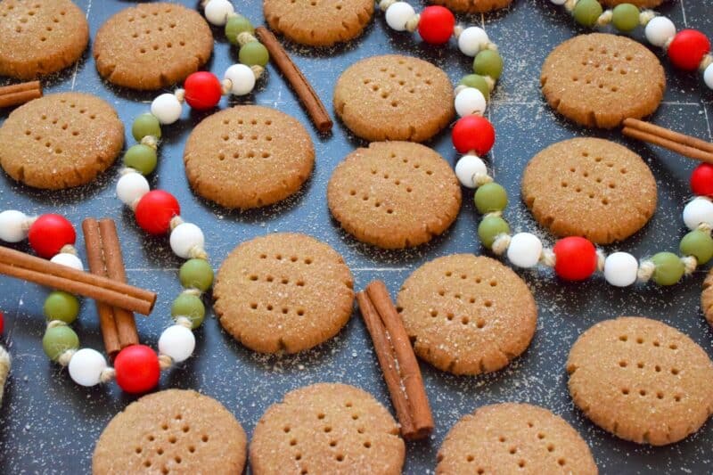 One can never get enough shortbread at Christmastime! This delicious shortbread cookie is prepared with brown sugar and cinnamon. Rolled in a cinnamon-sugar mixture, this classic, old-fashioned sweet shortbread recipe is a new and updated take on everyone's favourite holiday cookie! #cinnamon #shortbread #cookies #sugar #christmas #holiday #baking