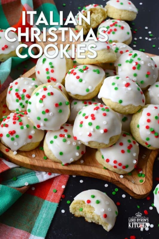 Italian Christmas Cookies just might be one of the most sought-after holiday cookies ever - right after shortbread! These soft, moist, and sweet cookies are prepared with salted butter and ricotta cheese. You just know that if those two ingredients are in anything, it's going to be delicious! Topped with icing and sprinkles, these just scream Christmas! #italian #cookies #ricotta