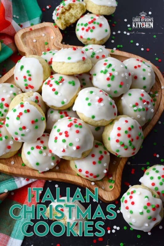 Italian Christmas Cookies just might be one of the most sought-after holiday cookies ever - right after shortbread! These soft, moist, and sweet cookies are prepared with salted butter and ricotta cheese. You just know that if those two ingredients are in anything, it's going to be delicious! Topped with icing and sprinkles, these just scream Christmas! #italian #cookies #ricotta