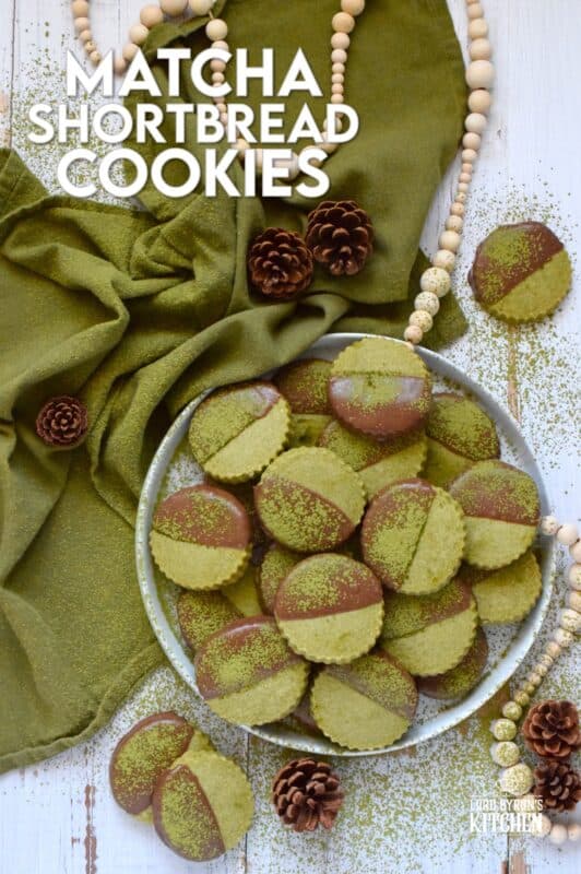 A classic, old-fashioned sweet shortbread recipe is infused with the slightly bitter flavour of matcha. Dipped in melted chocolate, these Matcha Shortbread Cookies boast a delicious pairing all in a beautifully simple festive cookie. These could be a great new addition to your annual cookie exchange! #matcha #whitechocolate #dipped #cookie