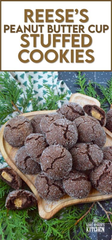 These cookies were prepared with the ultimate chocolate and peanut butter lover in mind. Reese's Peanut Butter Cup Stuffed Cookies are prepared with a rich chocolaty and fudgy base, which is wrapped around a single miniature peanut butter cup candy. These are perfect for Christmastime when calories don't count! #reeses #peanutbuttercups #stuffed #cookies