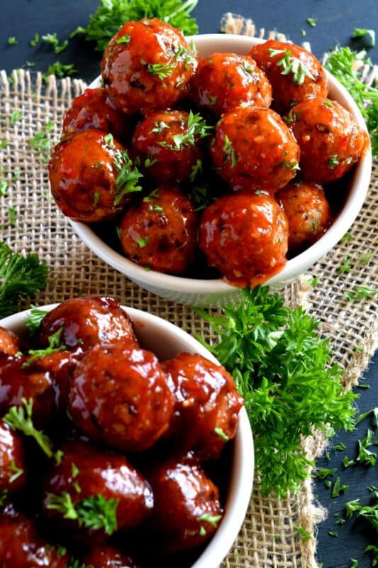 Black Bean and Tofu Meatballs are moist, flavourful, and vegetarian! Seasoned with familiar herbs and spices, and tossed in the sauce of your choice, these meatballs aim to please, and they do just that! Serve these as an appetizer, with your favourite pasta, or as I like to do, with piping hot mashed potatoes! #meatballs #blackbean #tofu #vegetarian